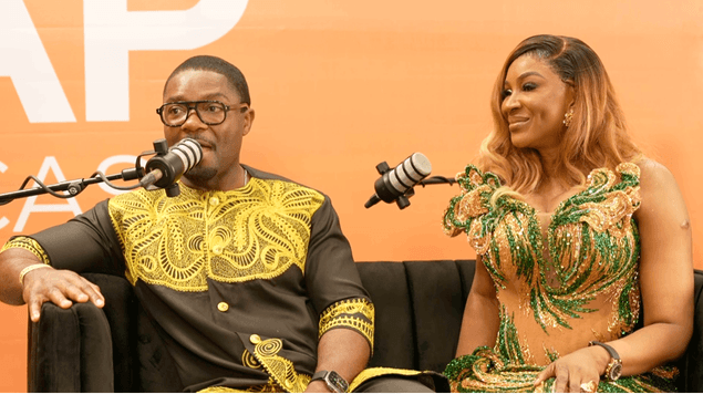 Host and guest in sequined and embroidered looks mid-interview