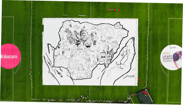 Aerial view of Fola David's Guinness World Record drawing on the pitch